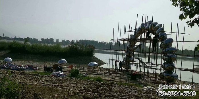 鵝卵石大門雕塑，公園美陳雕塑，不銹鋼鏡面拱門雕塑